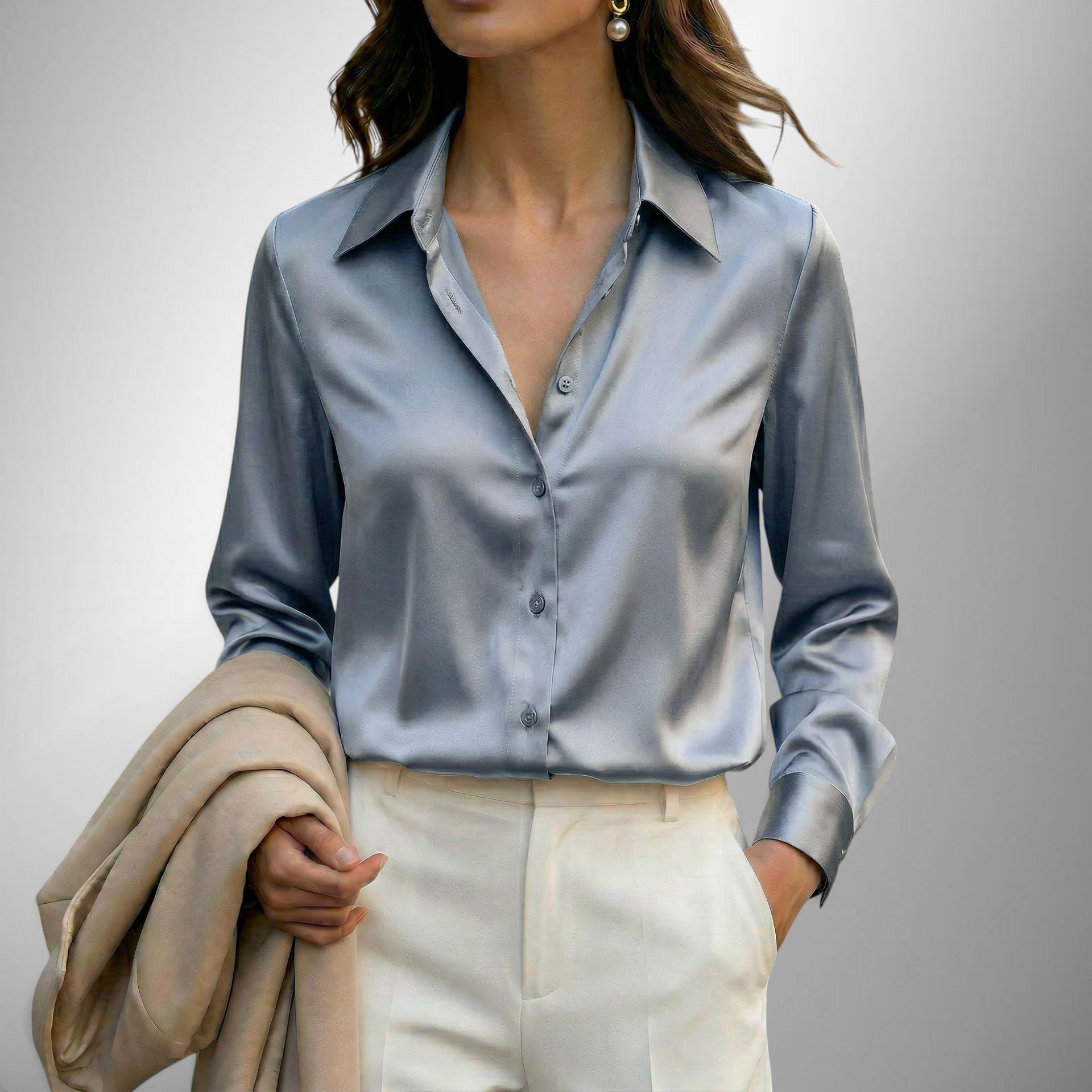 ZOFIA ATELIER LENA elegant satin blouse in light blue with lapel neckline and button-down front.