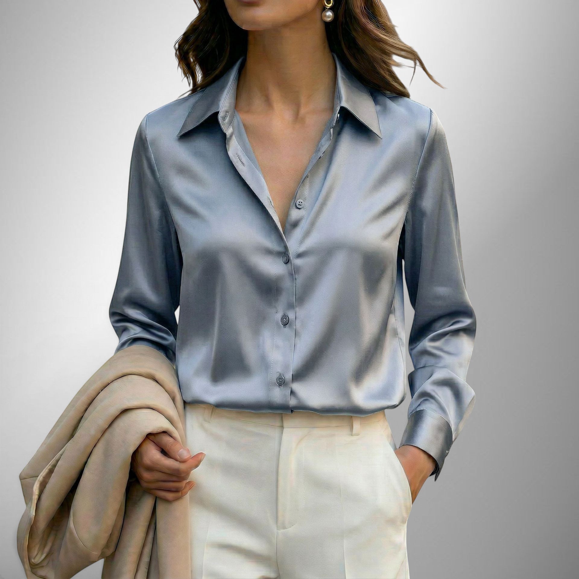 ZOFIA ATELIER LENA elegant satin blouse in light blue with lapel neckline and button-down front.