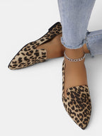 ZOFIA ATELIER leopard print pointed toe flats with a shallow-cut upper and slip-on design.