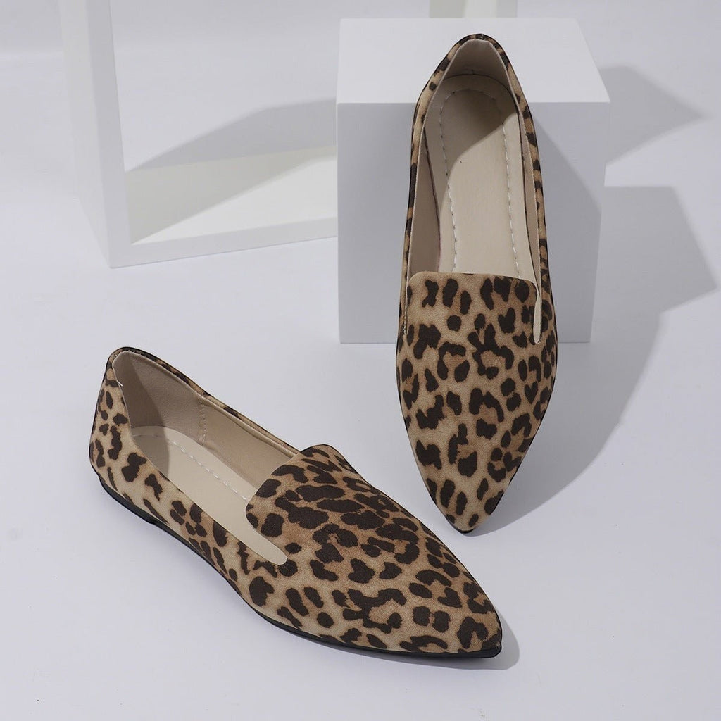 ZOFIA ATELIER leopard print pointed toe flats with a shallow-cut upper and slip-on design.