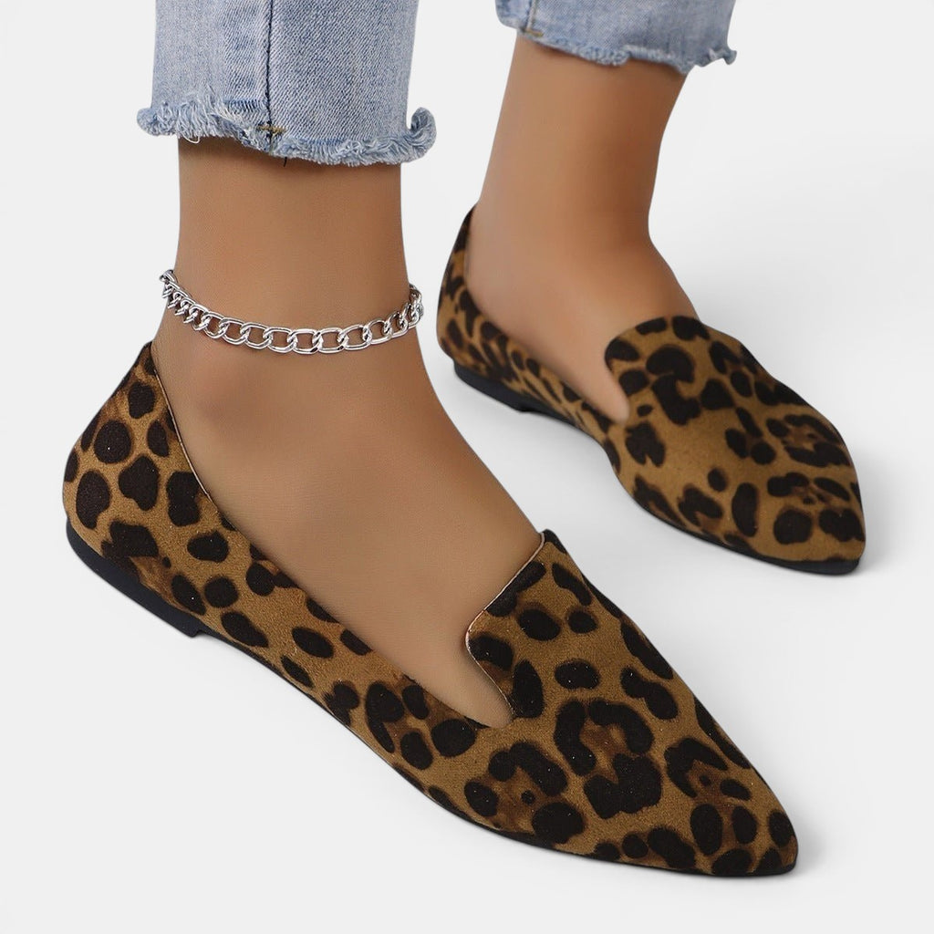 ZOFIA ATELIER leopard print pointed toe flats with a shallow-cut upper and slip-on design.
