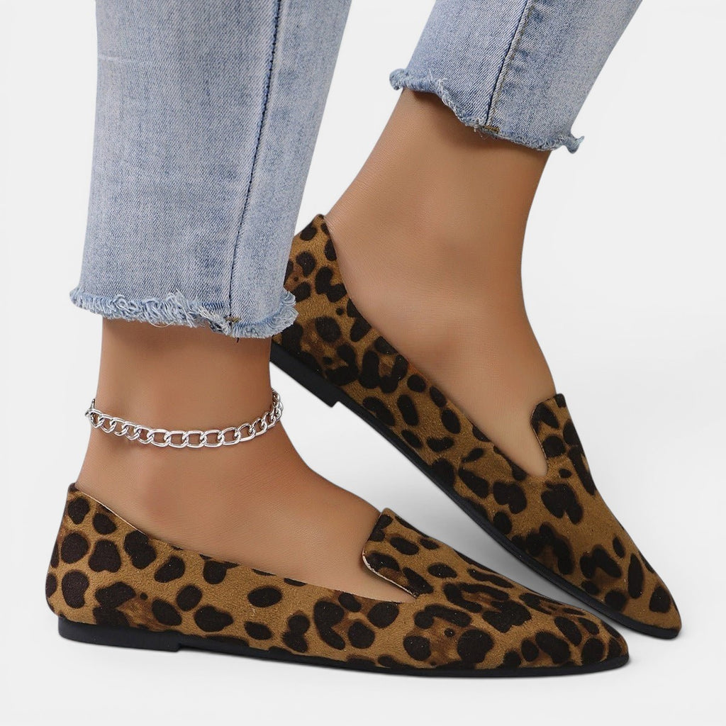 ZOFIA ATELIER leopard print pointed toe flats with a shallow-cut upper and slip-on design.