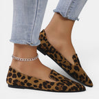 ZOFIA ATELIER leopard print pointed toe flats with a shallow-cut upper and slip-on design.