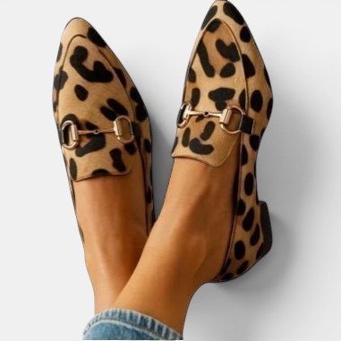 ZOFIA ATELIER leopard print pointed toe flat pumps with gold horsebit detail.