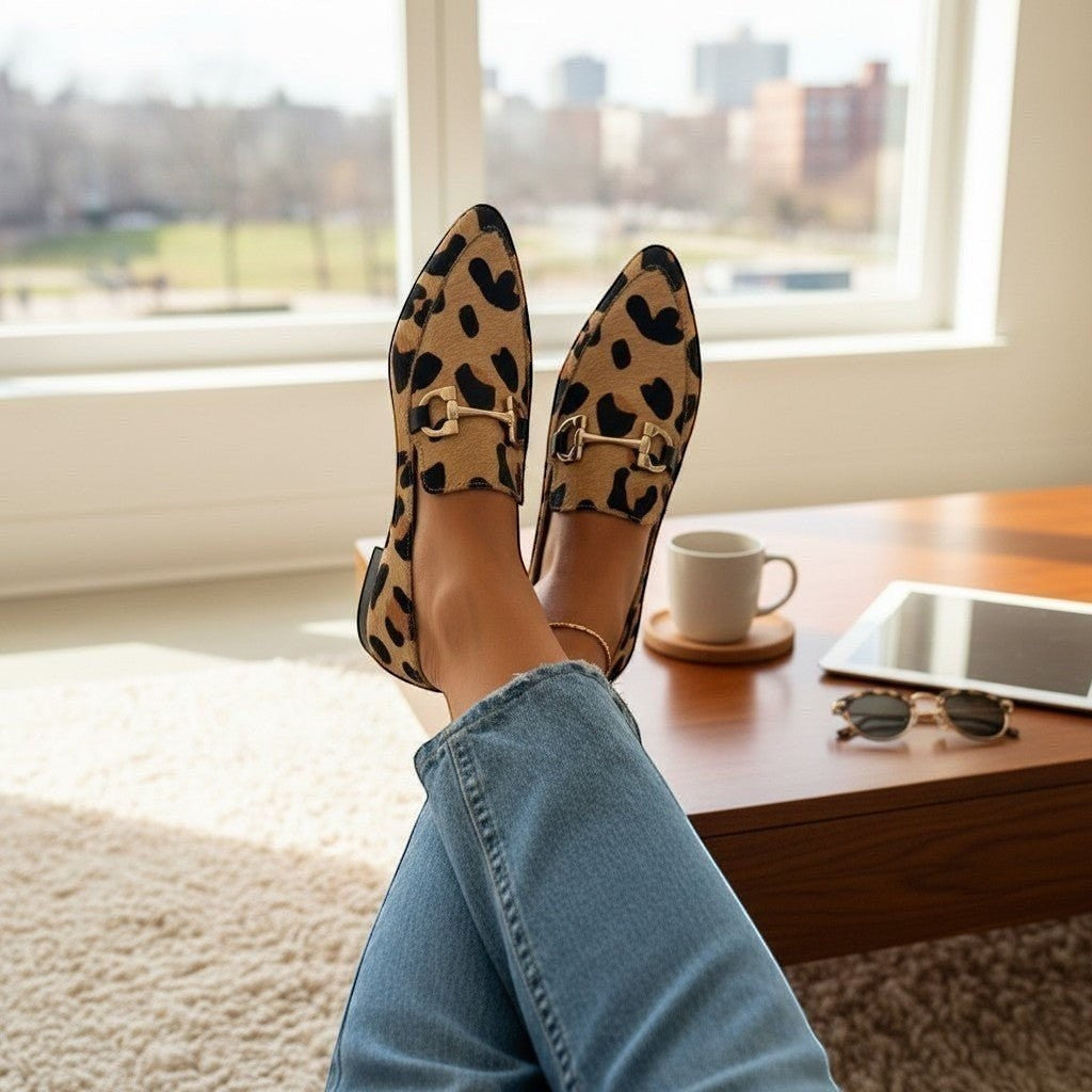 ZOFIA ATELIER leopard print pointed toe flat pumps with gold bit detail and shallow cut upper.