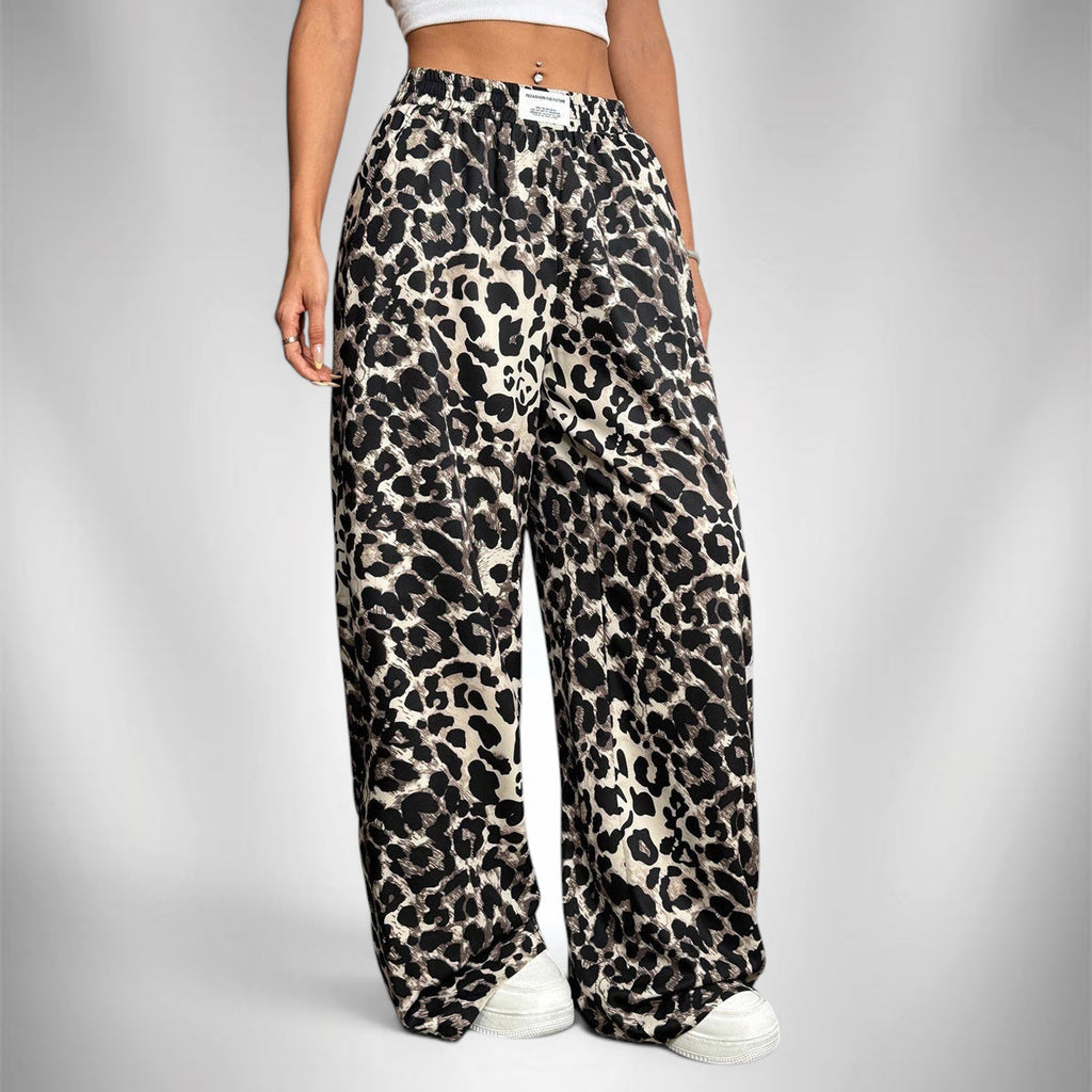 ZOFIA ATELIER women's full-length, wide-leg leopard print polyester pants with a mid-rise waistband.