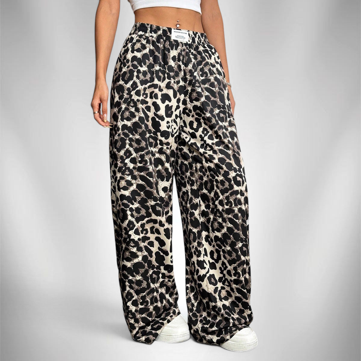 ZOFIA ATELIER women's full-length, wide-leg leopard print polyester pants with a mid-rise waistband.