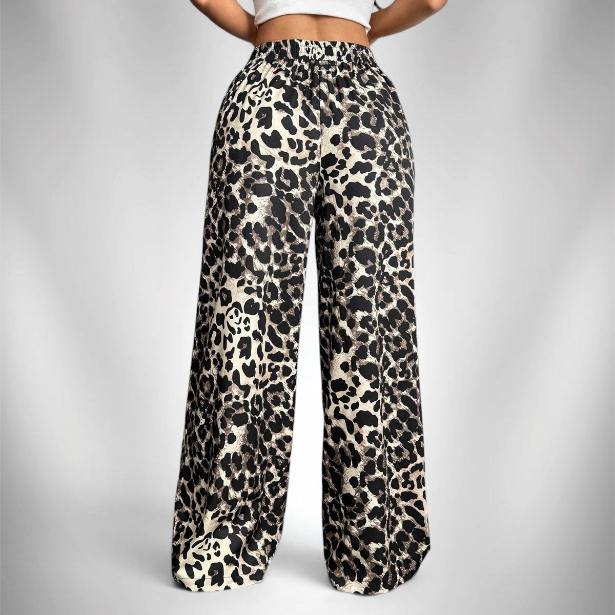 ZOFIA ATELIER women's full-length wide-leg pants in leopard print, made of polyester with a mid-rise waistband.