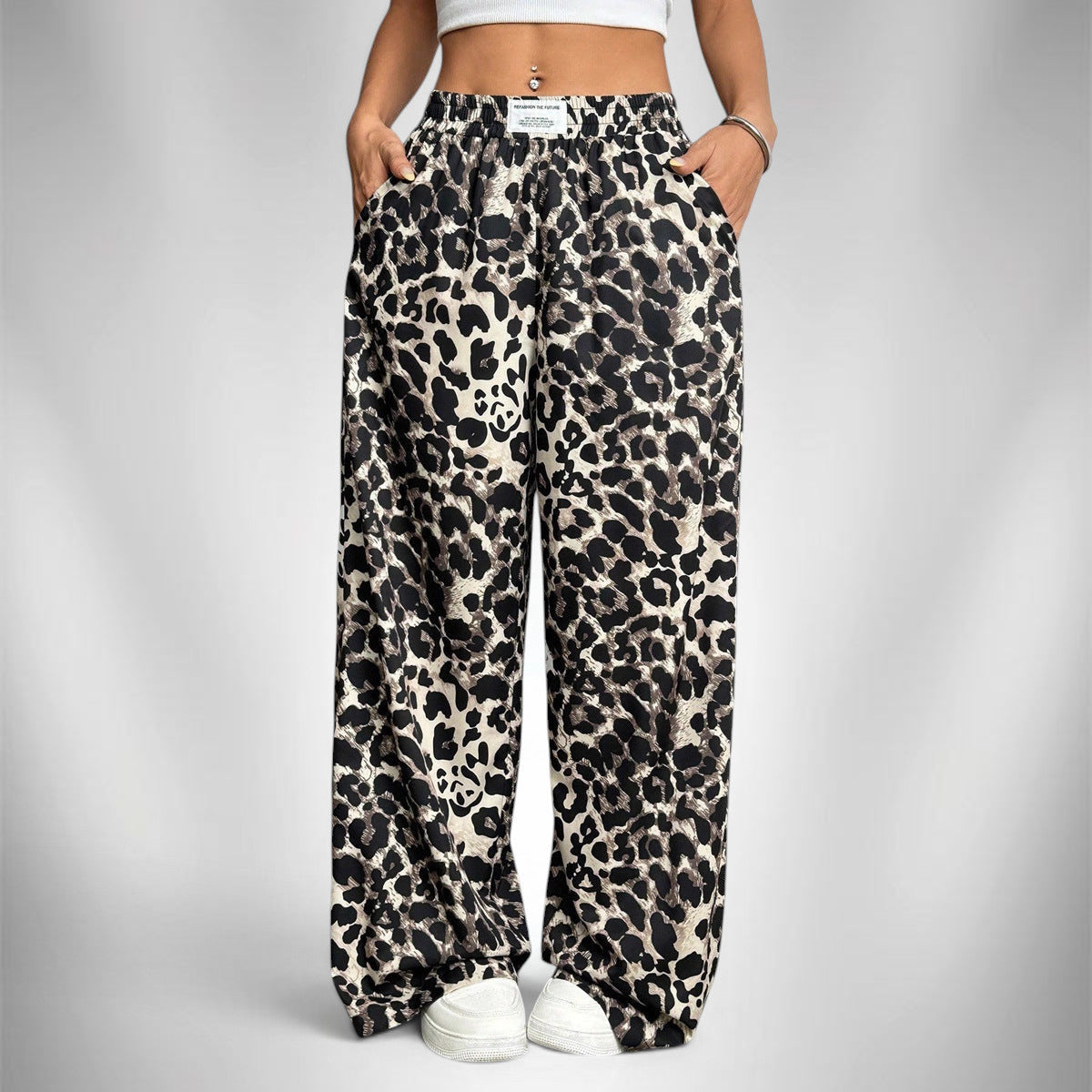 ZOFIA ATELIER women's full-length wide-leg leopard print polyester pants with mid-rise waist.