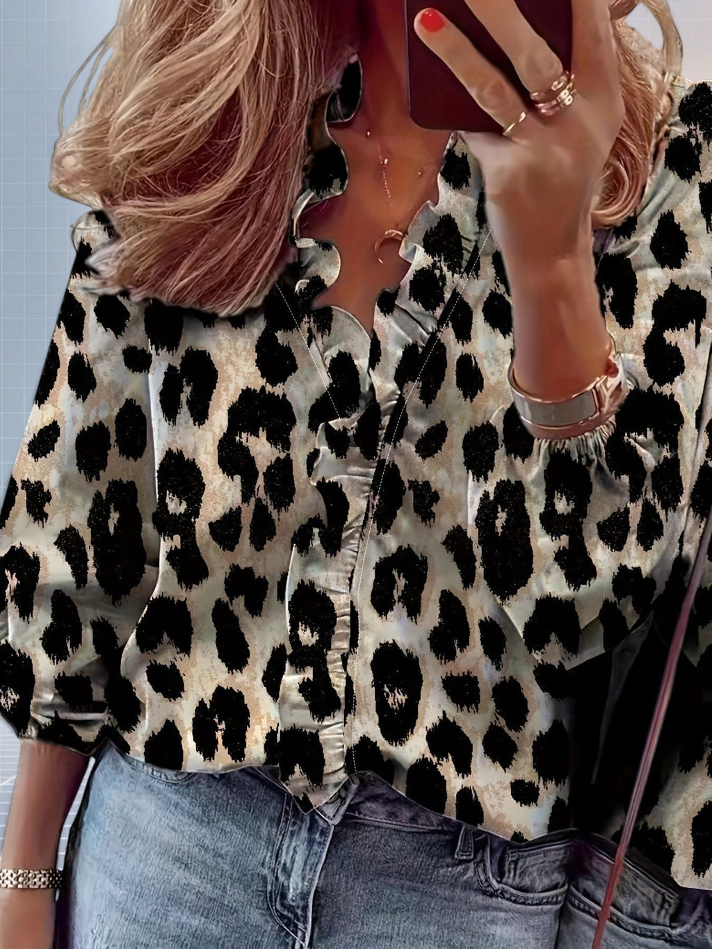 ZOFIA ATELIER Ewa leopard print ruffle blouse with split collar and long sleeves.
