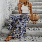 ZOFIA ATELIER women's high-waist, wide-leg trousers in blue and tan leopard print polyester with pockets.