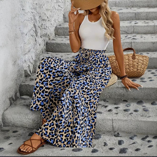 ZOFIA ATELIER women's high-waist, wide-leg trousers in blue and tan leopard print polyester with pockets.