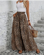 ZOFIA ATELIER women's high-waisted leopard print wide-leg trousers in polyester.
