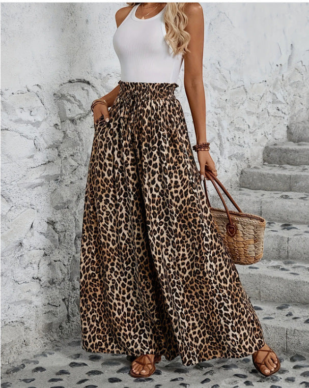 ZOFIA ATELIER women's high-waisted leopard print wide-leg trousers in polyester.