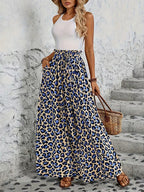 ZOFIA ATELIER women's high-waisted wide-leg trousers in leopard print polyester with pockets.