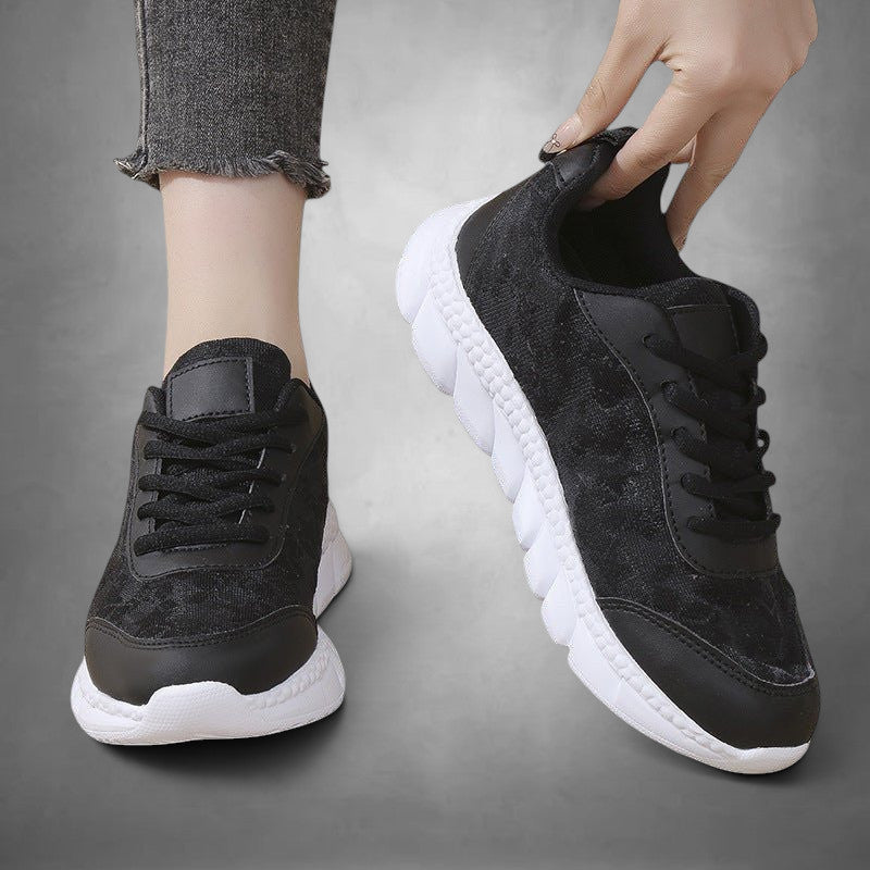ZOFIA ATELIER LIDIA black mesh casual running sneakers with white rubber sole and lace-up closure.