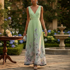 ZOFIA ATELIER light blue floral print V-neck sleeveless polyester gown with high waist and pullover closure.