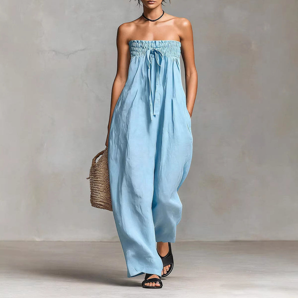 ZOFIA ATELIER light blue ruched strapless polyester jumpsuit with a drawstring waist and wide legs.