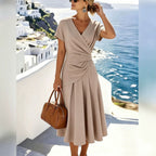 ZOFIA ATELIER Lucia V-neck two-piece set in beige polyester-ammonia blend with short sleeves and a pleated skirt.