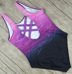 ZOFIA ATELIER LUDMIŁA vintage one-piece swimsuit with purple and black gradient and criss-cross back detail.