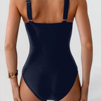 ZOFIA ATELIER Magdalena sleeveless navy blue striped one-piece swimsuit made of polyester. Elegant and streamlined fit.