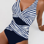 ZOFIA ATELIER Magdalena sleeveless navy and white striped one-piece swimsuit with a deep V-neck and wrap detail.