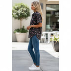 ZOFIA ATELIER MAJA black short-sleeved polyester top with pink heart print and a loose fit.