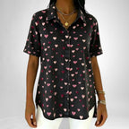 ZOFIA ATELIER MAJA heart-print loose top in black polyester with short sleeves and a button-up front.