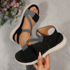 ZOFIA ATELIER MARIANA black PU beach sandals with grey patterned straps and Velcro closure.