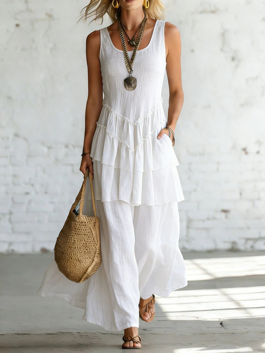 ZOFIA ATELIER MARIANA flowing white linen sleeveless long dress with tiered ruffles and relaxed fit.
