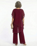 ZOFIA ATELIER MARINA chiffon suit set in rose red with quarter sleeves and wide-leg trousers.