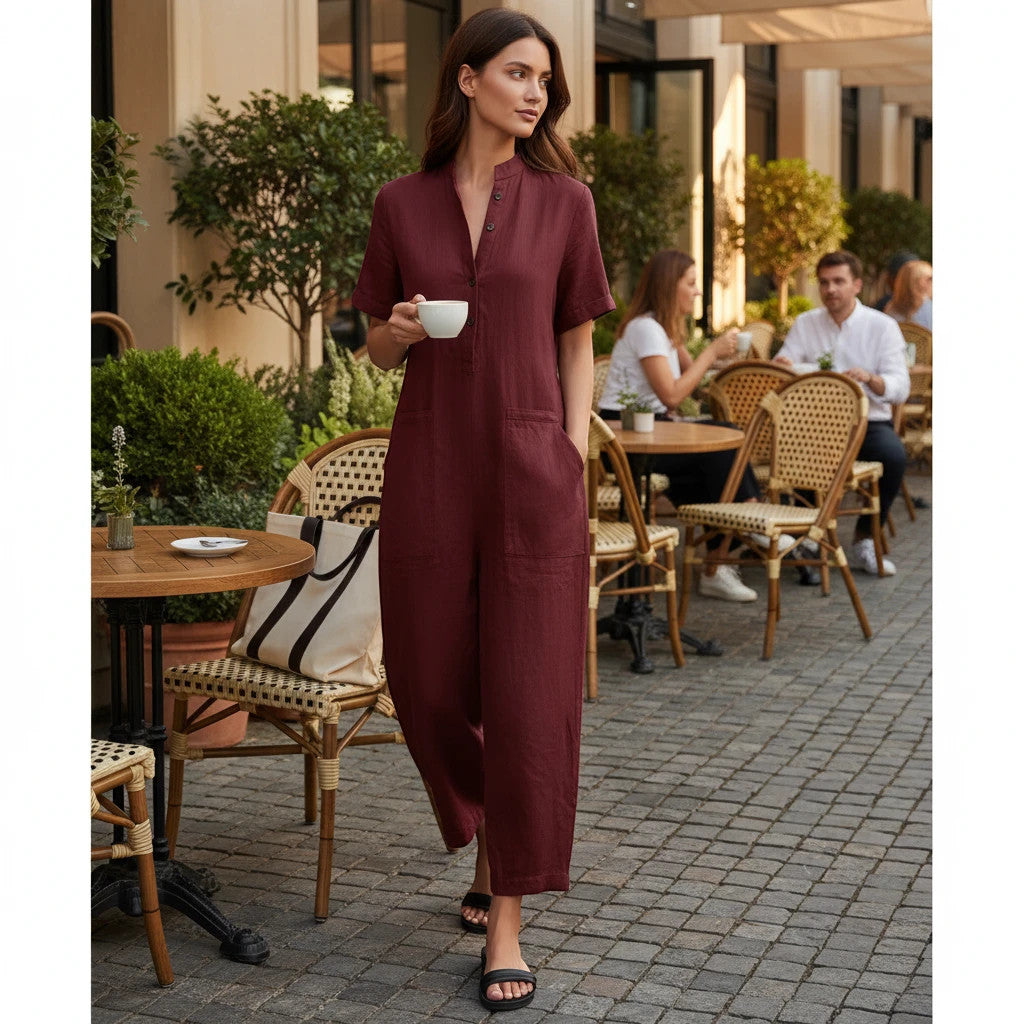 ZOFIA ATELIER MARINA burgundy linen-blend jumpsuit with short sleeves, stand collar, and wide legs.