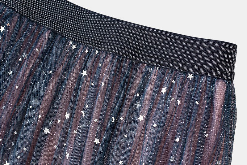 ZOFIA ATELIER Mariola sequin star skirt in navy blue net yarn with a pink underlayer. Features a celestial pattern of stars and moons.