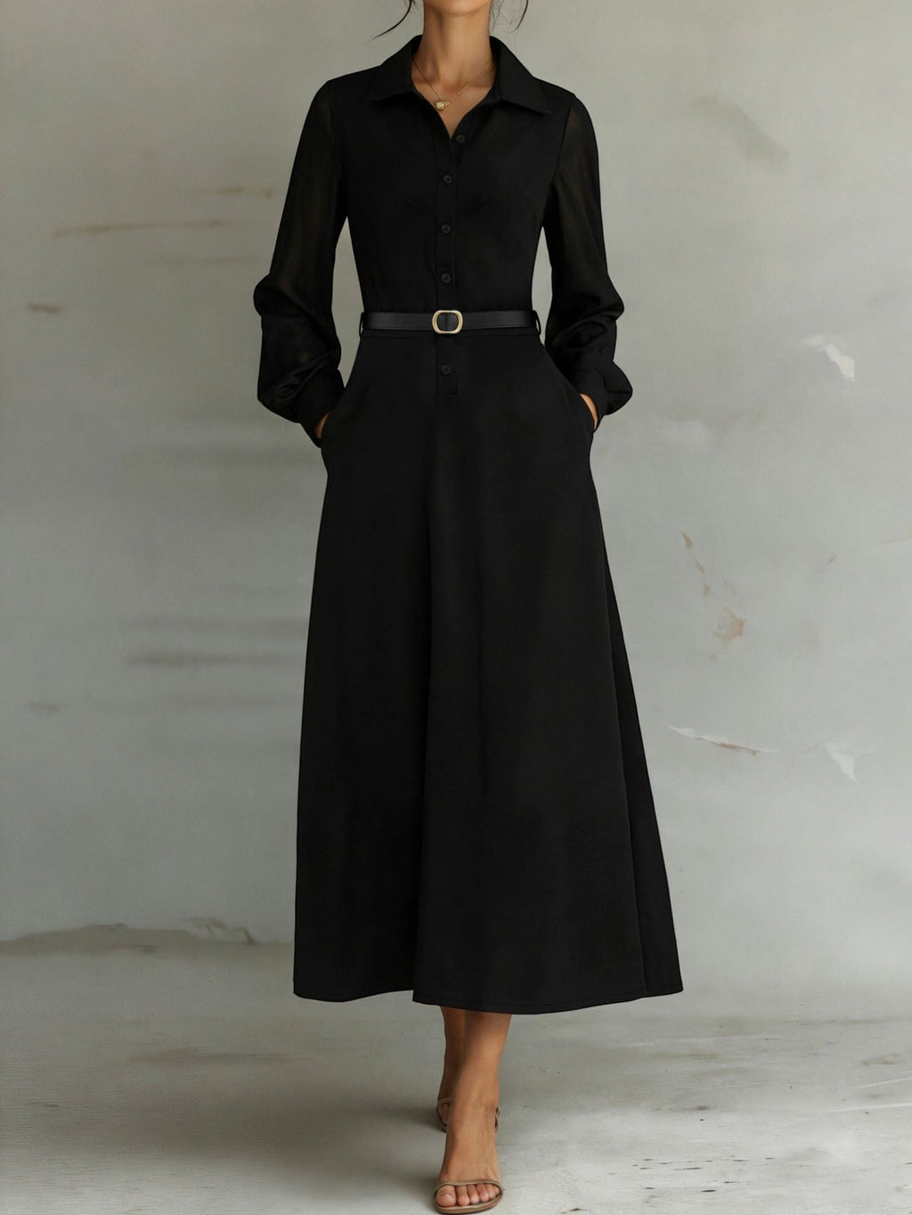 ZOFIA ATELIER Marisol black maxi shirt dress with sheer puff sleeves, collared neckline, button front, and belt.
