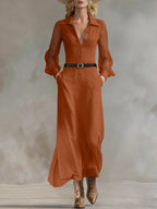 ZOFIA ATELIER Marisol burnt orange maxi shirt dress with sheer puff sleeves, collared neckline, button front, and belt.