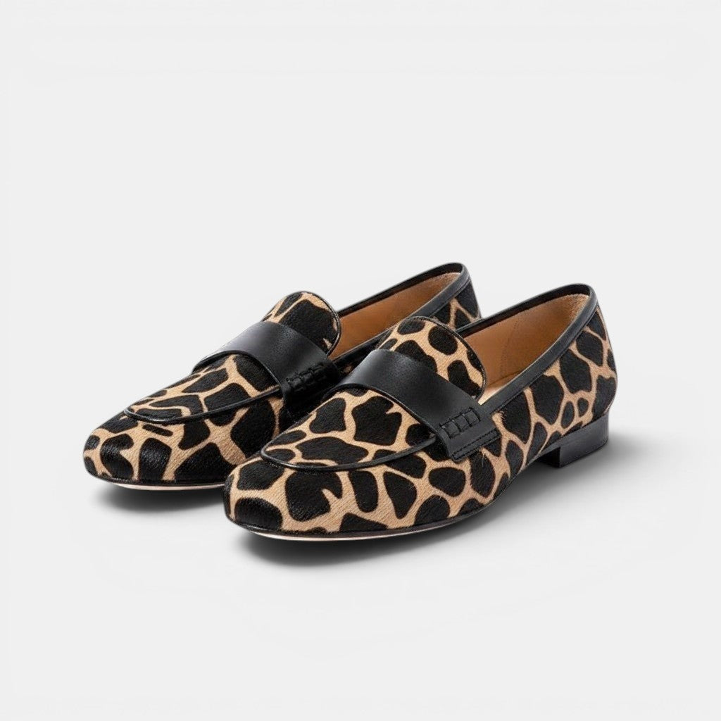 ZOFIA ATELIER Marta spring casual loafers in tan and black giraffe print with black leather strap detail.