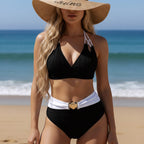 ZOFIA ATELIER MARTA black ribbed halter bikini with white high-waisted bottoms and gold shell buckle.