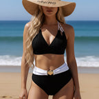 ZOFIA ATELIER MARTA black ribbed halter bikini with white high-waisted bottoms and gold shell buckle.