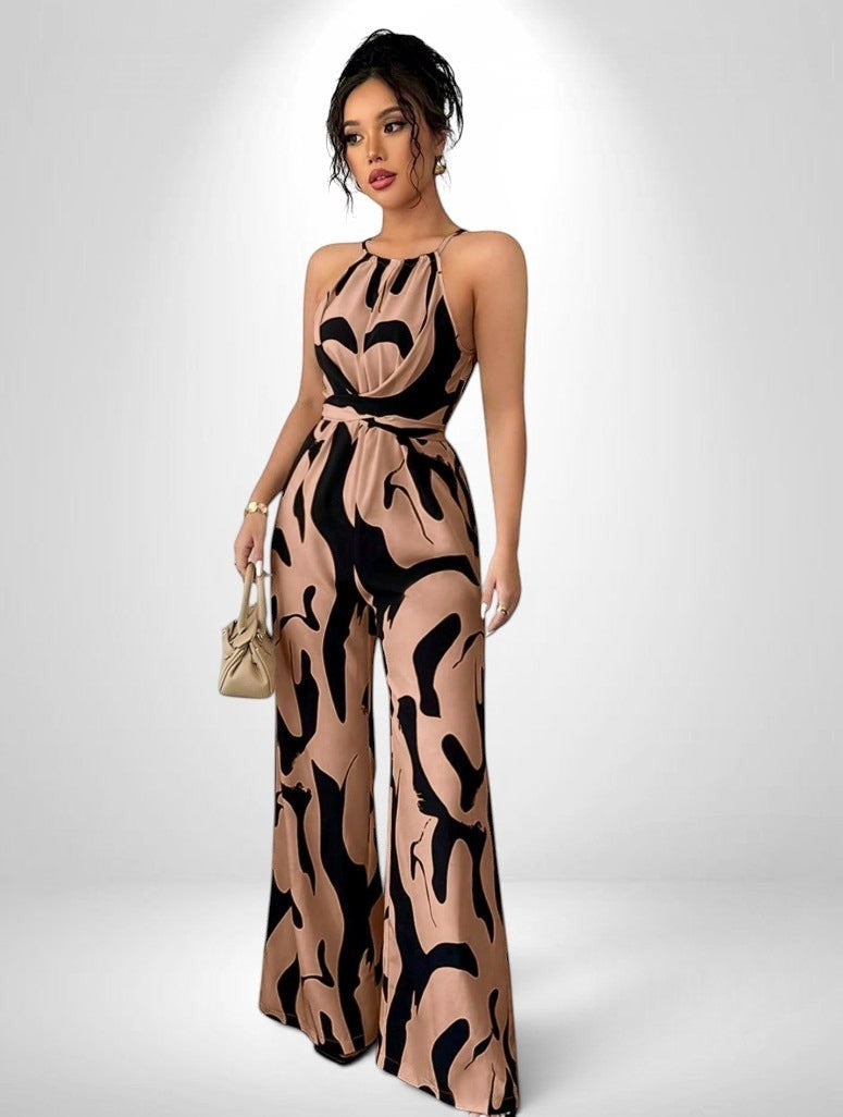 ZOFIA ATELIER milk-stripe halter jumpsuit with wide-leg pants and elastic waist. Sleeveless polyester design.