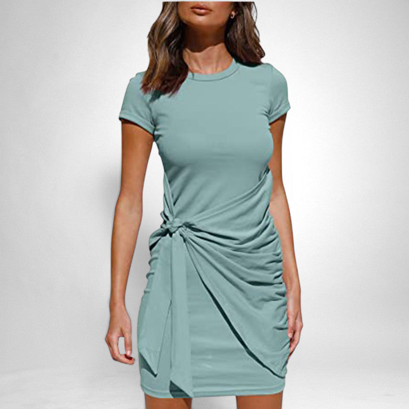 ZOFIA ATELIER mint green short sleeve ruched tie waist mini dress with round neckline.