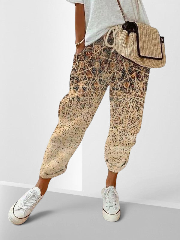 ZOFIA ATELIER multi-color patterned cropped cotton-linen pants with a loose fit and drawstring waist.
