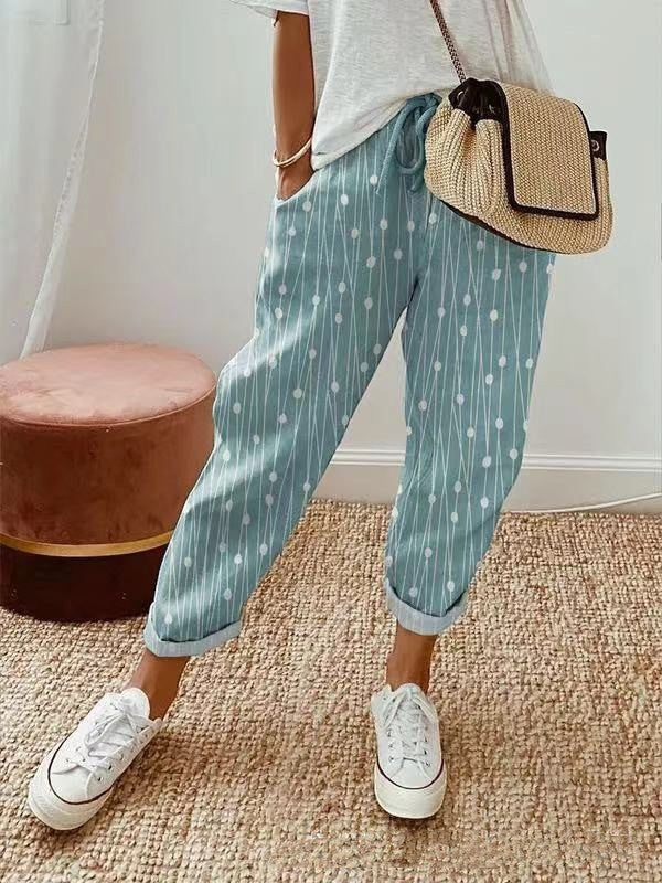 ZOFIA ATELIER light blue cropped cotton-linen pants with white polka dot and stripe pattern, loose fit, mid-waist, and drawstring.
