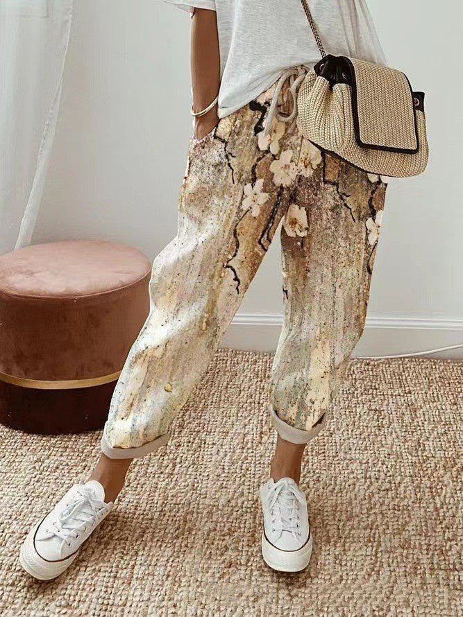 ZOFIA ATELIER multi-color floral print cropped cotton-linen pants with a loose fit and mid-waist.