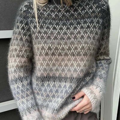 ZOFIA ATELIER multicolor loose pullover sweater with geometric pattern and round neck, made of acrylic and polyester.