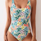 ZOFIA ATELIER Nadia floral print one-piece swimsuit with scoop neck and high-cut legs.