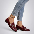 ZOFIA ATELIER Natalia patent square toe loafers in burgundy. Flat sole, slip-on style, and gold hardware detail.
