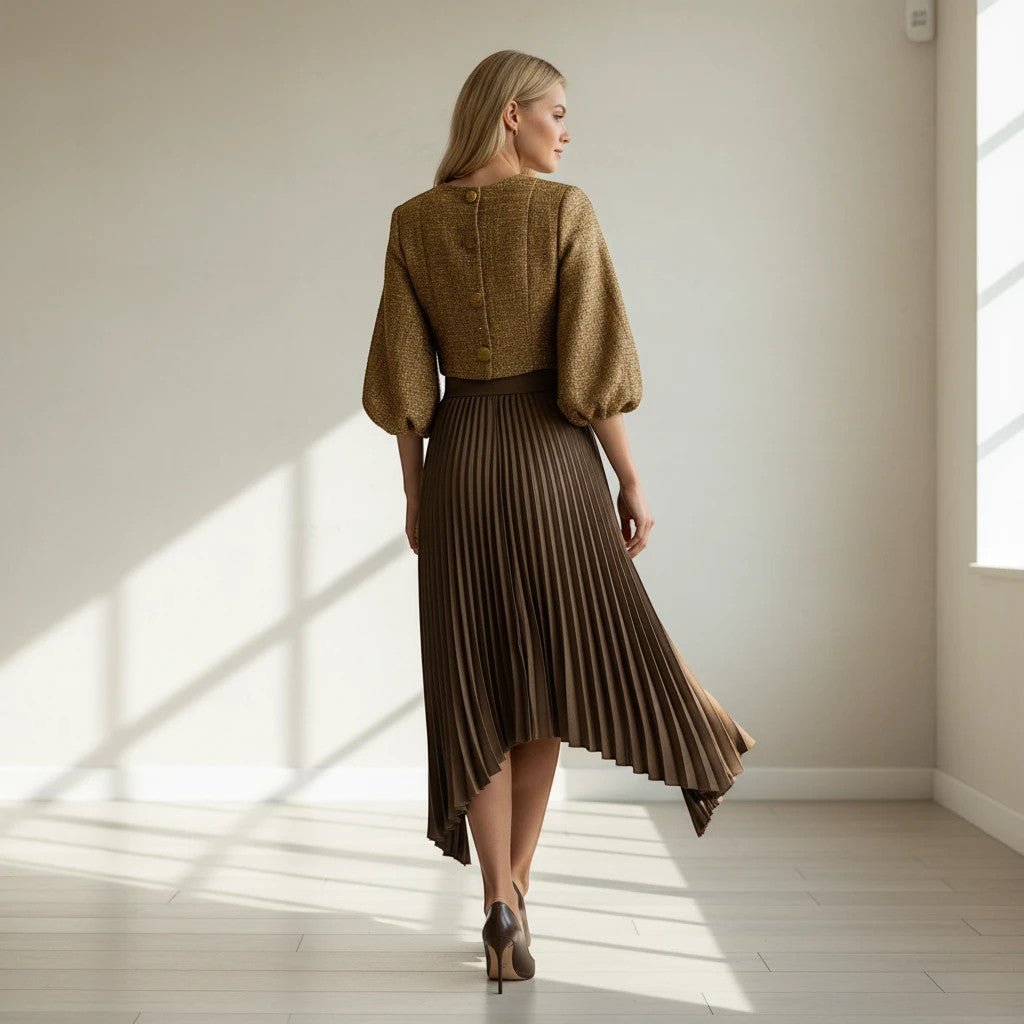 ZOFIA ATELIER Natalia pleated midi skirt in khaki, 100% polyester, high-waist design with fluid movement.