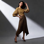 ZOFIA ATELIER Natalia pleated midi skirt in khaki polyester with a high-waist design and asymmetrical hem.