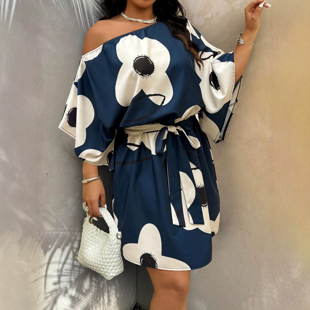 ZOFIA ATELIER navy blue and apricot floral off-shoulder mini dress with relaxed fit and A-line skirt.