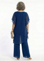 ZOFIA ATELIER navy blue chiffon suit set with quarter sleeves and wide-leg trousers.